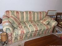 Front view of Barrymore 3-seat sofa showing upholstery pattern, cushions, rolled arms and skirt