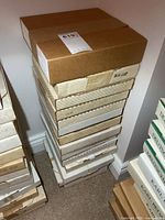 Stack of boxed collector plates