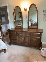 Dresser with twin mirrors assembled