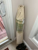 Full view of drawstring canvas bag containing hammock chair