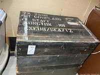 Top view showing stencilled markings and worn black paint