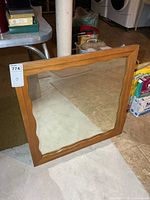 Front view of solid wood square mirror