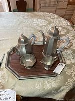 Full view of five-piece pewter service on tray