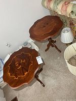 pair of matching wood side tables next to sofa