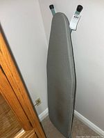 front view of ironing board with cover