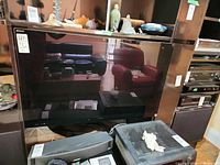 Front view of Sony 46-inch TV on shelf