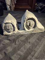 Front view of soapstone carving showing both faces