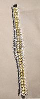 Full view of bracelet showing stone layout and overall design