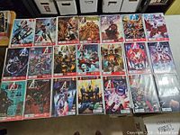 All twenty-one Avengers World comics laid out showing front covers and numbering