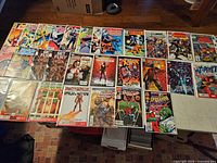 Overhead view showing bulk of comics spread on table