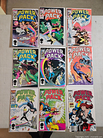 Nine Power Pack comics laid out in three-by-three grid