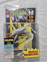 Front view of sealed Spawn Violator action figure packaging