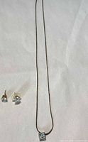 Necklace full length with pendant and both stud earrings