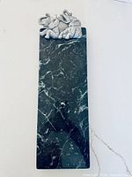 Full view of marble board showing color, shape, and elephant accent
