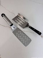 Both spatulas side by side on countertop