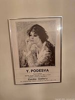 Framed exhibition poster overall view