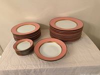 Stacked dinner, side plates, bowls showing pattern and counts