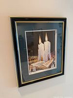 Front view of framed 3D print showing image of Shabbat candles and book