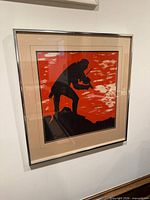 Frontal view of framed artwork showing image, mat and frame