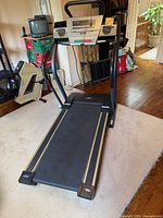 Full view of NordicTrack C-2300 treadmill on carpet