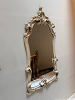 Front view showing entire mirror and frame