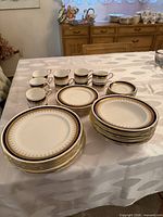 Full set showing stacks of plates, bowls, cups