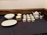 Entire 41-piece Dorato tea service laid out