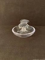 Overall view of Sevres crystal ring dish with bird finial
