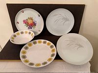 Front view of five assorted dishes