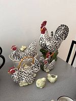 All ceramic Poulet pieces grouped on table