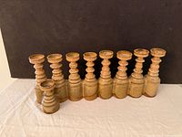 Front view showing all nine candle holders and overall form