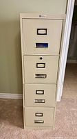 Full front view of cabinet showing four drawers