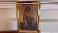 Full view of framed print showing artwork and ornate gilt frame