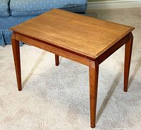 Full view of side table showing overall design and legs