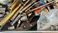 Drawer showing sockets, extensions, locking pliers