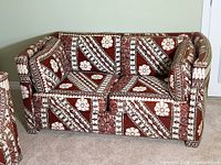 Front view of Bauhaus loveseat showing overall design and upholstery pattern