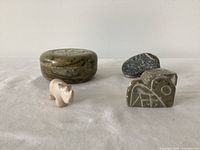 Group view of all four stone items