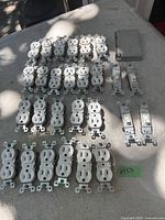 All receptacles, switches and covers laid out on table