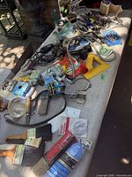 overview of full table of assorted tools and hardware