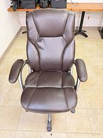 Front view of brown high-back office chair