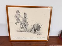 Full view of framed poster showing image, text and frame