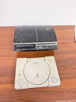 Top view of both consoles showing overall condition