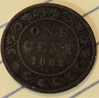 Reverse of 1882 Canada one-cent coin showing denomination and date