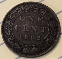 Reverse side showing ONE CENT 1892 within maple leaf wreath