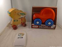 Wooden pull animal toy, boxed Little Tikes push car side by side