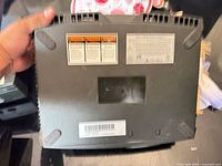 bottom of original Xbox console showing labels and wear