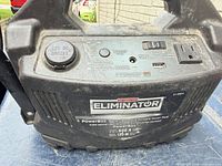 Front view showing brand label, control panel with 12 V socket cover, AC outlet and switches