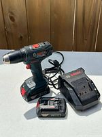 Bosch 18V cordless drill with charger and two batteries