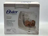 Front of sealed retail box showing product image and features