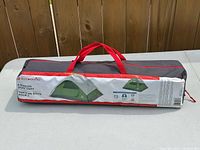 Full view of Outbound tent carry case showing branding and capacity